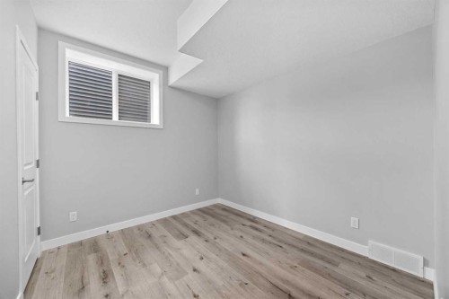 74 Lucas Place Nw, Calgary, AB - Indoor Photo Showing Other Room