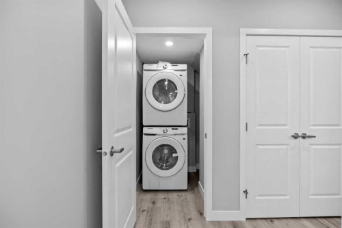 74 Lucas Place Nw, Calgary, AB - Indoor Photo Showing Laundry Room