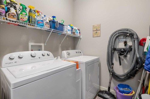 124 Evergreen Circle Sw, Calgary, AB - Indoor Photo Showing Laundry Room