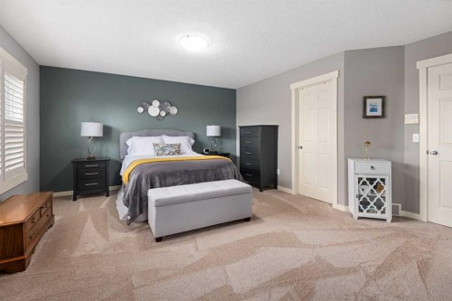 124 Evergreen Circle Sw, Calgary, AB - Indoor Photo Showing Bedroom