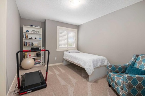 124 Evergreen Circle Sw, Calgary, AB - Indoor Photo Showing Bedroom