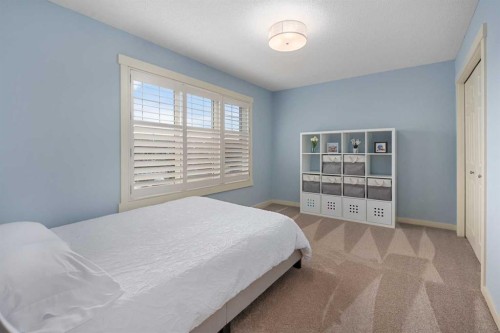 124 Evergreen Circle Sw, Calgary, AB - Indoor Photo Showing Bedroom
