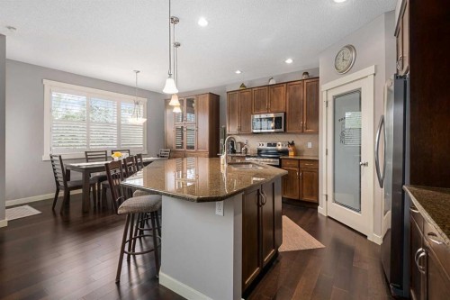 124 Evergreen Circle Sw, Calgary, AB - Indoor Photo Showing Kitchen With Double Sink With Upgraded Kitchen