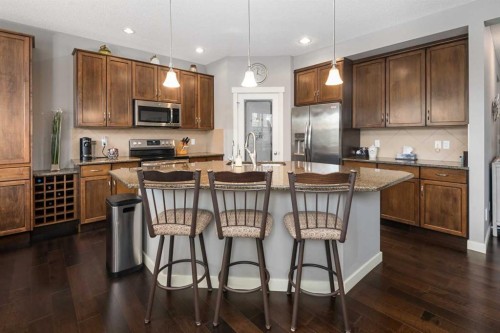 124 Evergreen Circle Sw, Calgary, AB - Indoor Photo Showing Kitchen With Double Sink With Upgraded Kitchen