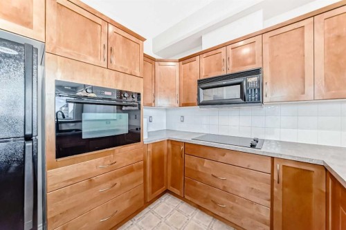 410-3111 34 Avenue Nw, Calgary, AB - Indoor Photo Showing Kitchen
