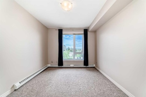 410-3111 34 Avenue Nw, Calgary, AB - Indoor Photo Showing Other Room