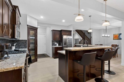9 Westridge Way, Okotoks, AB - Indoor Photo Showing Kitchen With Upgraded Kitchen