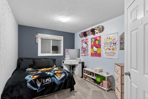 9 Westridge Way, Okotoks, AB - Indoor Photo Showing Bedroom
