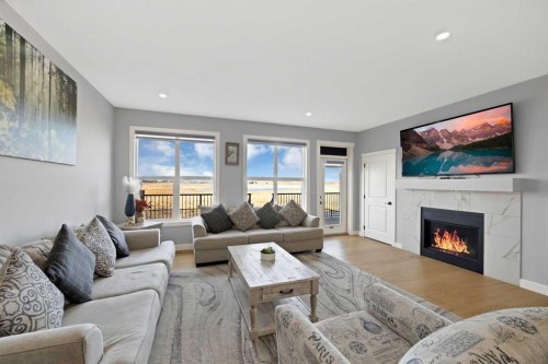 678 Cornerstone Avenue Ne, Calgary, AB - Indoor Photo Showing Living Room With Fireplace