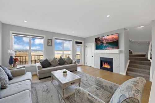 678 Cornerstone Avenue Ne, Calgary, AB - Indoor Photo Showing Living Room With Fireplace