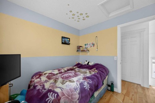 35 Erin Green Place Se, Calgary, AB - Indoor Photo Showing Bedroom
