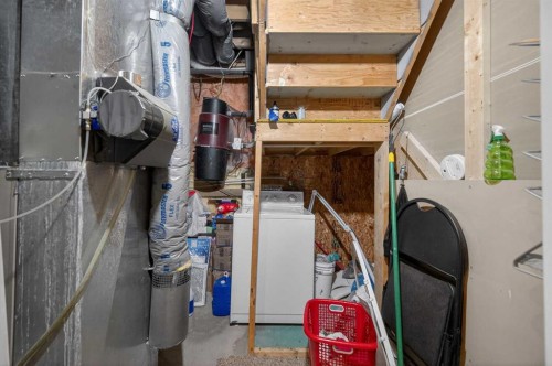 35 Erin Green Place Se, Calgary, AB - Indoor Photo Showing Laundry Room