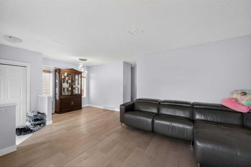 35 Erin Green Place Se, Calgary, AB - Indoor Photo Showing Living Room