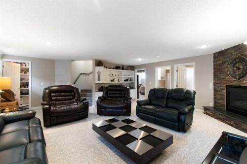 654 Lakeside Drive, Rural Vulcan County, AB - Indoor Photo Showing Living Room With Fireplace