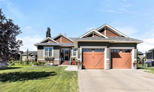 82 Briegel Road, Olds, AB - Outdoor With Facade