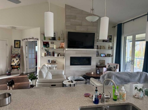 82 Briegel Road, Olds, AB - Indoor With Fireplace