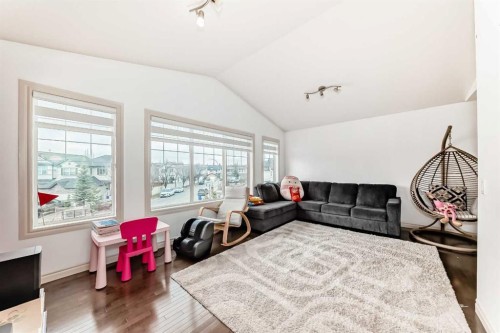 58 Bridleridge Green Sw, Calgary, AB - Indoor Photo Showing Living Room