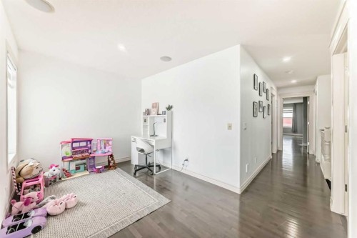 58 Bridleridge Green Sw, Calgary, AB - Indoor Photo Showing Other Room