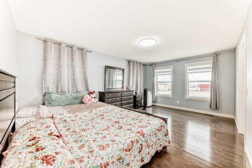58 Bridleridge Green Sw, Calgary, AB - Indoor Photo Showing Bedroom