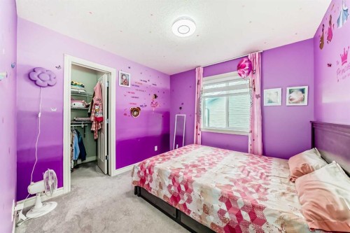 58 Bridleridge Green Sw, Calgary, AB - Indoor Photo Showing Bedroom
