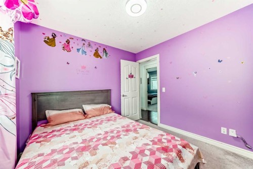 58 Bridleridge Green Sw, Calgary, AB - Indoor Photo Showing Bedroom