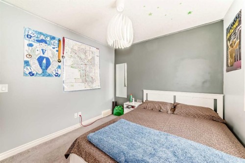 58 Bridleridge Green Sw, Calgary, AB - Indoor Photo Showing Bedroom