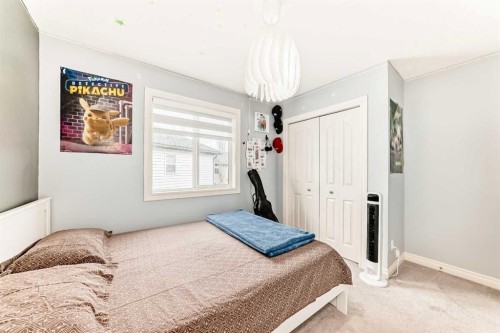 58 Bridleridge Green Sw, Calgary, AB - Indoor Photo Showing Bedroom