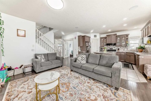 58 Bridleridge Green Sw, Calgary, AB - Indoor Photo Showing Living Room