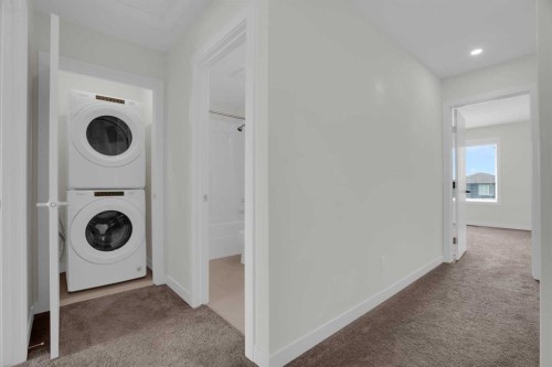 59 D'Arcy Boulevard, Okotoks, AB - Indoor Photo Showing Laundry Room