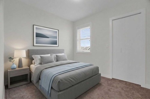 59 D'Arcy Boulevard, Okotoks, AB - Indoor Photo Showing Bedroom