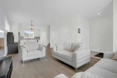 59 D'Arcy Boulevard, Okotoks, AB - Indoor Photo Showing Living Room