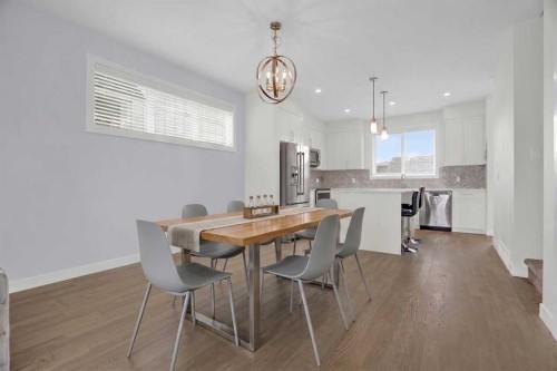 59 D'Arcy Boulevard, Okotoks, AB - Indoor Photo Showing Dining Room