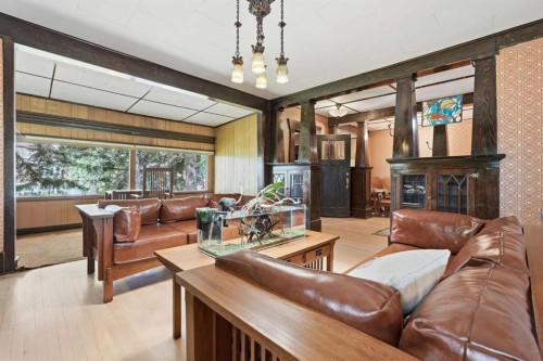 1316 15 Street Nw, Calgary, AB - Indoor Photo Showing Other Room With Fireplace