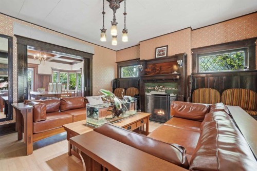 1316 15 Street Nw, Calgary, AB - Indoor Photo Showing Living Room With Fireplace