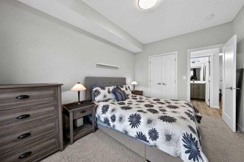 403-71 Shawnee Common Sw, Calgary, AB - Indoor Photo Showing Bedroom