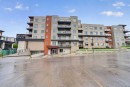 403-71 Shawnee Common Sw, Calgary, AB  - Outdoor With Balcony With Facade 
