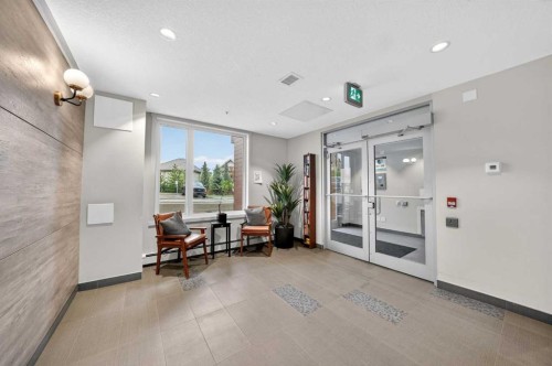 403-71 Shawnee Common Sw, Calgary, AB - Indoor Photo Showing Other Room