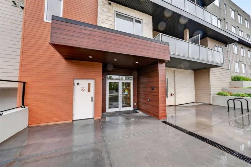 403-71 Shawnee Common Sw, Calgary, AB - Outdoor With Balcony With Exterior