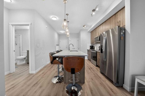 403-71 Shawnee Common Sw, Calgary, AB - Indoor Photo Showing Kitchen