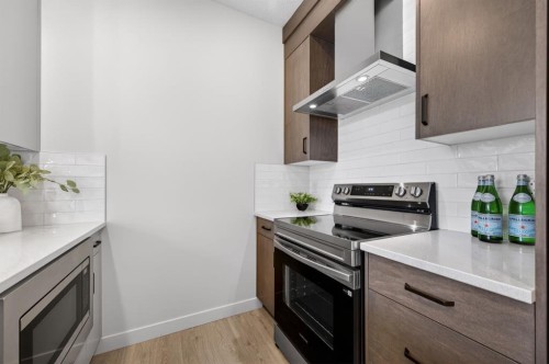 1059 Bayview Crescent, Airdrie, AB - Indoor Photo Showing Kitchen