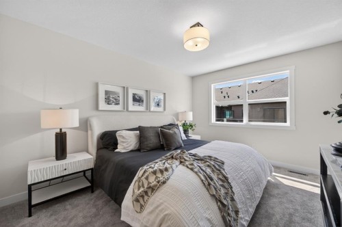 1059 Bayview Crescent, Airdrie, AB - Indoor Photo Showing Bedroom