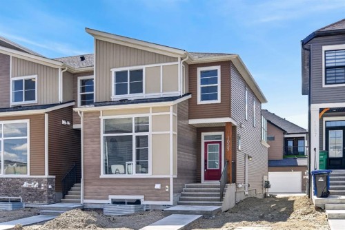 1059 Bayview Crescent, Airdrie, AB - Outdoor With Facade