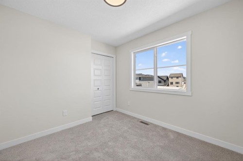 1059 Bayview Crescent, Airdrie, AB - Indoor Photo Showing Other Room