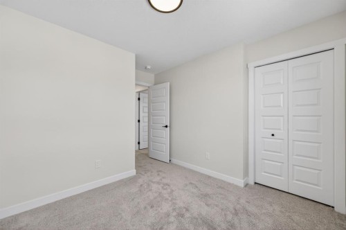 1059 Bayview Crescent, Airdrie, AB - Indoor Photo Showing Other Room