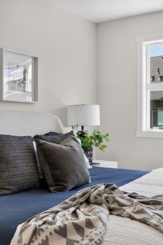 1059 Bayview Crescent, Airdrie, AB - Indoor Photo Showing Bedroom