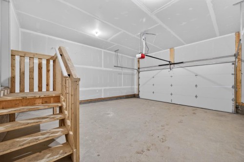 1059 Bayview Crescent, Airdrie, AB - Indoor Photo Showing Garage