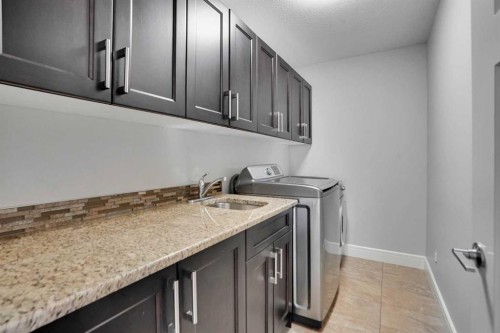 265 Saddlelake Drive Ne, Calgary, AB - Indoor Photo Showing Laundry Room