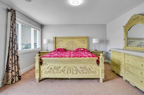 265 Saddlelake Drive Ne, Calgary, AB - Indoor Photo Showing Bedroom