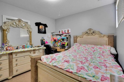 265 Saddlelake Drive Ne, Calgary, AB - Indoor Photo Showing Bedroom