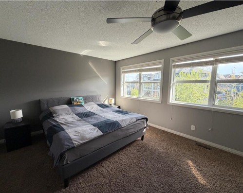 119 Auburn Bay Avenue Se, Calgary, AB - Indoor Photo Showing Bedroom